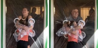 Menina cria uma cortina de plástico para poder abraçar avós na quarentena Menina cria uma cortina de plástico para poder abraçar avós na quarentena